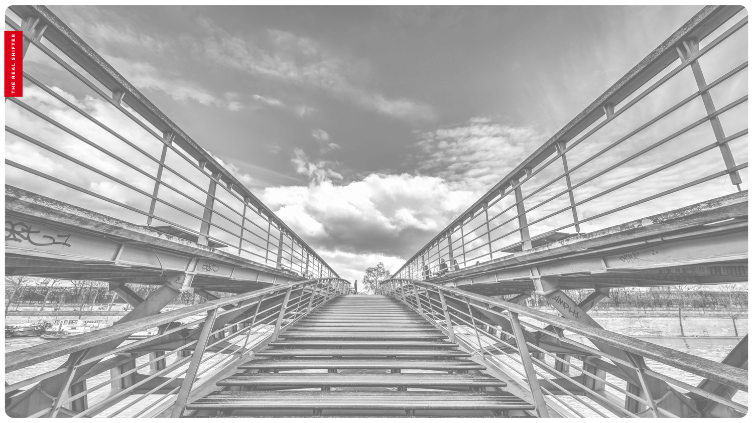 a black and white photo of a bridge